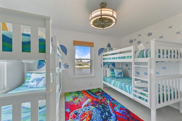 4003 Indian Beach Dr, Galveston, TX 77554 - carpeted bedroom with baseboards