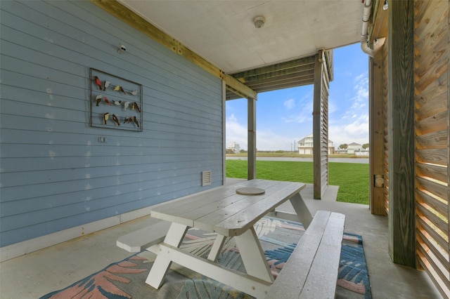 4003 Indian Beach Dr, Galveston, TX 77554 - view of patio featuring outdoor dining area