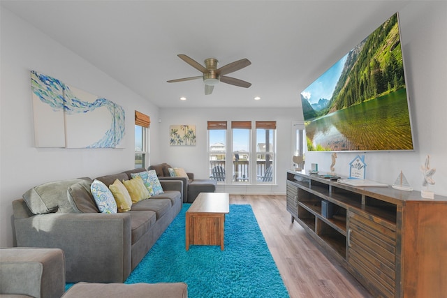 4003 Indian Beach Dr, Galveston, TX 77554 - living area with light wood finished floors, a ceiling fan, and recessed lighting