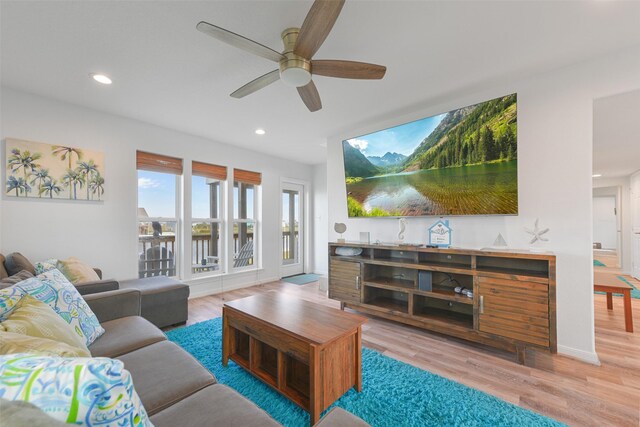 4003 Indian Beach Dr, Galveston, TX 77554 - living area with a ceiling fan, wood finished floors, and recessed lighting