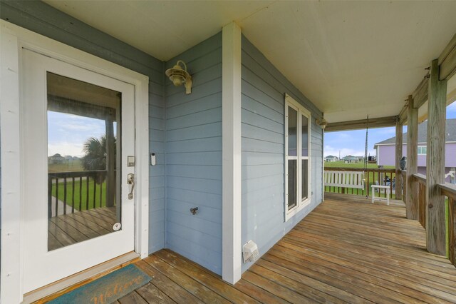 4003 Indian Beach Dr, Galveston, TX 77554 - view of wooden porch
