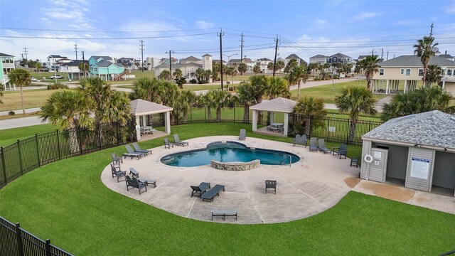 4003 Indian Beach Dr, Galveston, TX 77554 - community pool featuring a gazebo, a residential view, and a patio