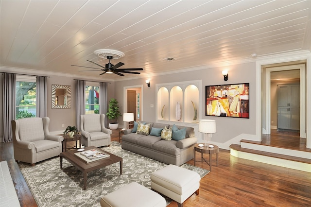 1031 Meyer St, Sealy, TX 77474 - living room featuring hardwood / wood-style flooring, ornamental molding, and a ceiling fan
