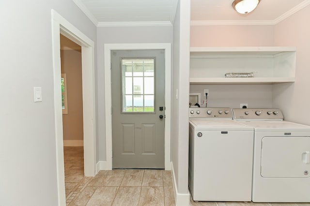 1031 Meyer St, Sealy, TX 77474 - washroom with washer and clothes dryer and crown molding