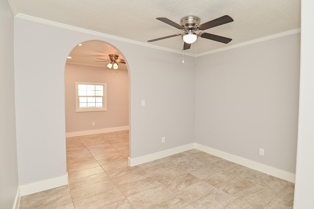 1031 Meyer St, Sealy, TX 77474 - empty room with a ceiling fan, crown molding, and arched walkways