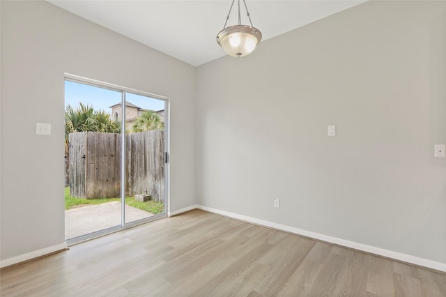 8315 Greys Ln, Houston, TX 77095 - empty room featuring wood finished floors and baseboards
