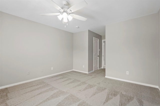 8315 Greys Ln, Houston, TX 77095 - spare room featuring carpet floors, ceiling fan, baseboards, and a smoke detector