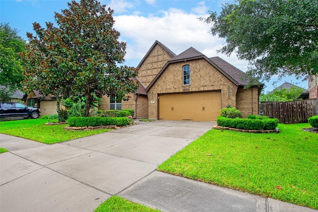 20702 Elderwood Terrace Dr, Richmond, TX 77406 - view of front of property with brick siding, driveway, a garage, and a shingled roof