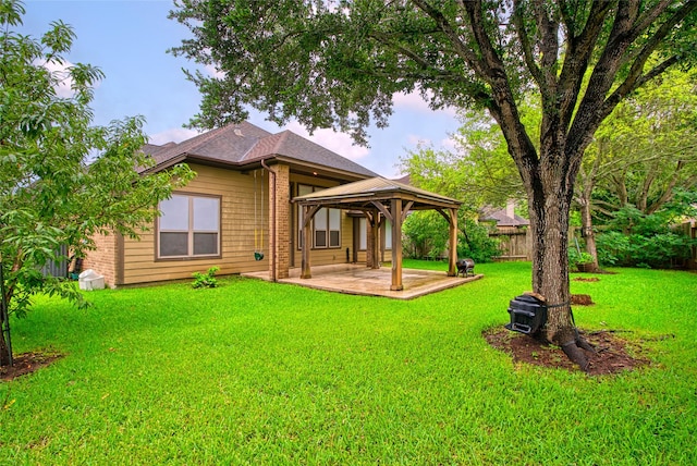 20702 Elderwood Terrace Dr, Richmond, TX 77406 - back of house with a gazebo and a patio