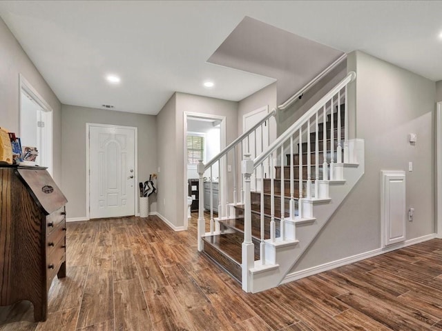238 Royal Pnes, Lufkin, TX 75904 - entrance foyer featuring wood finished floors, baseboards, stairs, and recessed lighting
