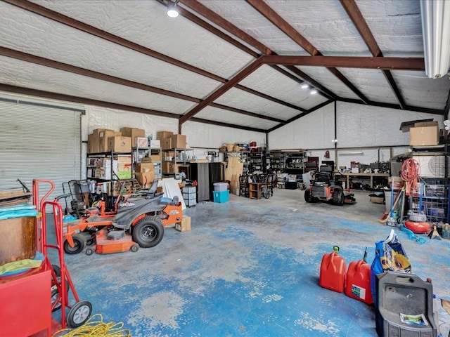 238 Royal Pnes, Lufkin, TX 75904 - garage featuring a workshop area