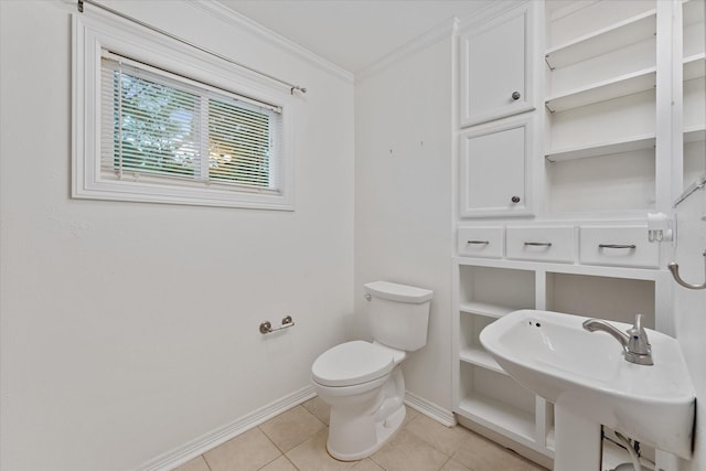 11104 Quinlan N Lake Dr, Conroe, TX 77303 - half bathroom featuring tile patterned floors and ornamental molding