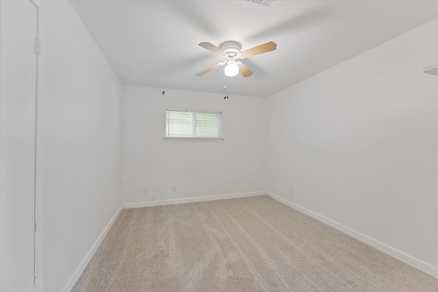11104 Quinlan N Lake Dr, Conroe, TX 77303 - unfurnished room with light colored carpet and ceiling fan