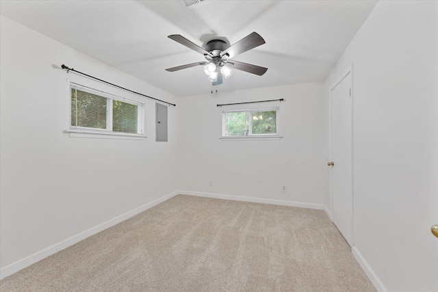 11104 Quinlan N Lake Dr, Conroe, TX 77303 - empty room with light carpet and a ceiling fan