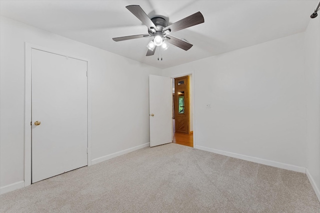 11104 Quinlan N Lake Dr, Conroe, TX 77303 - unfurnished bedroom with carpet floors and ceiling fan
