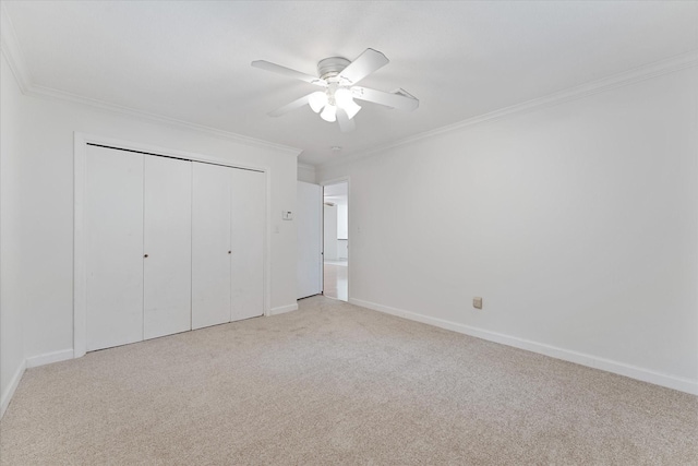 11104 Quinlan N Lake Dr, Conroe, TX 77303 - unfurnished bedroom featuring carpet flooring, ornamental molding, a closet, and ceiling fan
