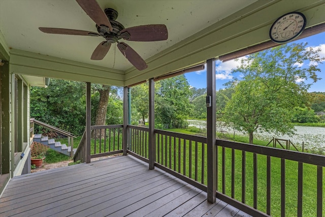 11104 Quinlan N Lake Dr, Conroe, TX 77303 - unfurnished sunroom featuring a water view, ceiling fan, and view of wooded area