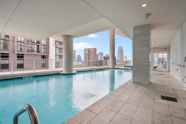 4521 San Felipe St Unit 3101, Houston, TX 77027 - indoor pool featuring a view of skyline