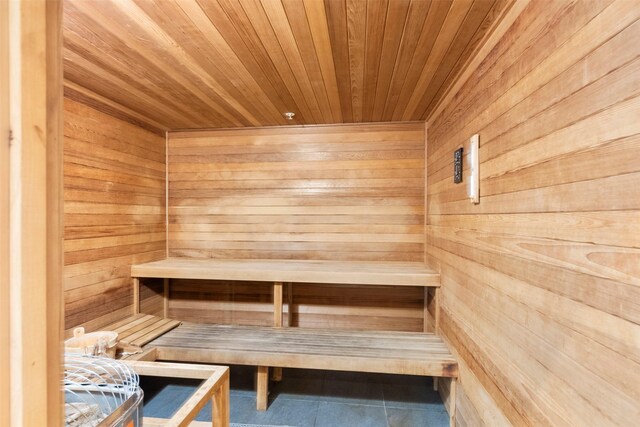 4521 San Felipe St Unit 3101, Houston, TX 77027 - sauna / steam room with wooden walls, wooden ceiling, and tile patterned flooring