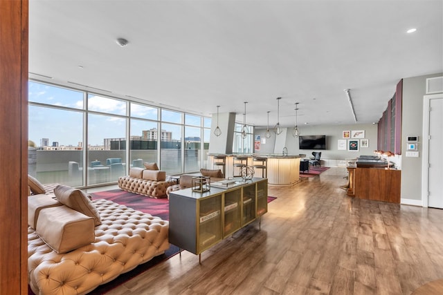 4521 San Felipe St Unit 3101, Houston, TX 77027 - living room with light wood-style floors and a city view