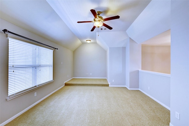 24430 Silverton Valley Ln, Katy, TX 77494 - empty room featuring carpet flooring, ceiling fan, lofted ceiling, and baseboards
