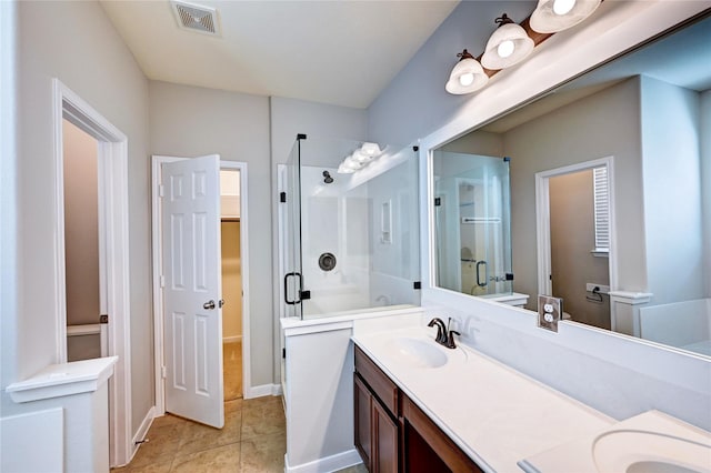 24430 Silverton Valley Ln, Katy, TX 77494 - bathroom featuring a stall shower, double vanity, toilet, and tile patterned floors