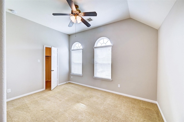 24430 Silverton Valley Ln, Katy, TX 77494 - carpeted empty room with a ceiling fan, a smoke detector, baseboards, and lofted ceiling
