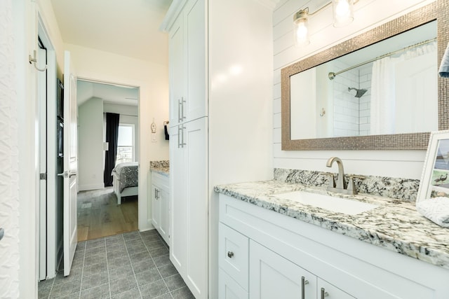 4003 Kiva Rd, Galveston, TX 77554 - ensuite bathroom with vanity and a shower with shower curtain