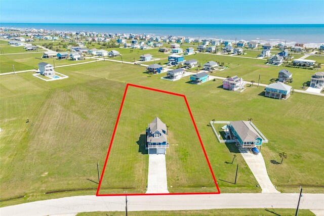 4003 Kiva Rd, Galveston, TX 77554 - aerial overview of property's location with property parcel outlined and a large body of water