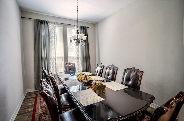 31007 Laurel Creek Ln, Conroe, TX 77385 - dining area featuring a chandelier, baseboards, and wood finished floors