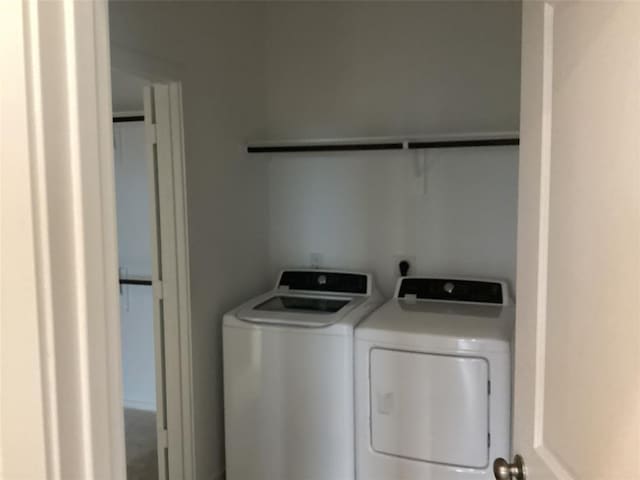 3105 Harrier Dr, Katy, TX 77493 - laundry room with washer and clothes dryer