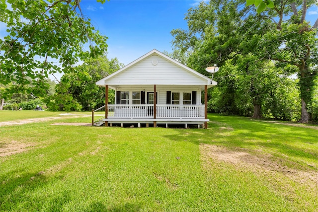 12602 24th St, Santa Fe, TX 77510 - view of front of home with a front yard and covered porch