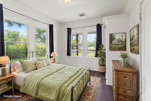 12602 24th St, Santa Fe, TX 77510 - bedroom featuring dark wood finished floors