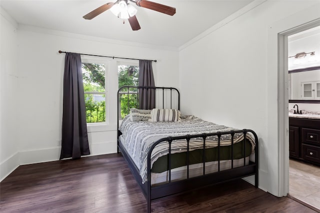 12602 24th St, Santa Fe, TX 77510 - bedroom featuring crown molding, wood finished floors, a sink, ceiling fan, and ensuite bathroom