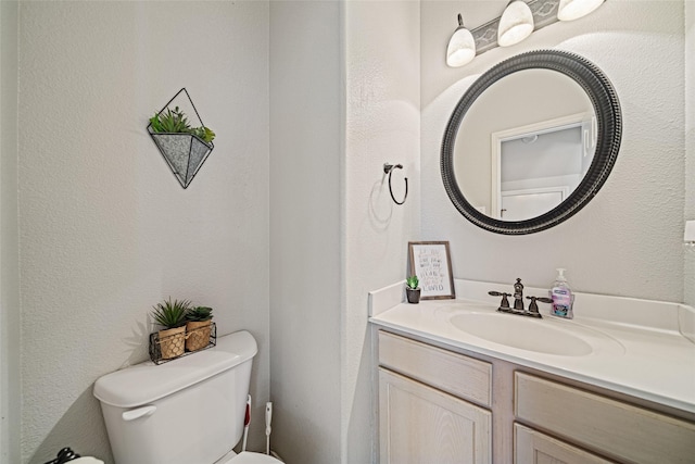 5325 High Bank Dr, Corpus Christi, TX 78413 - bathroom with toilet and vanity
