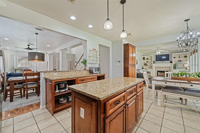 5325 High Bank Dr, Corpus Christi, TX 78413 - kitchen with open floor plan, ceiling fan, a center island, a fireplace, and recessed lighting