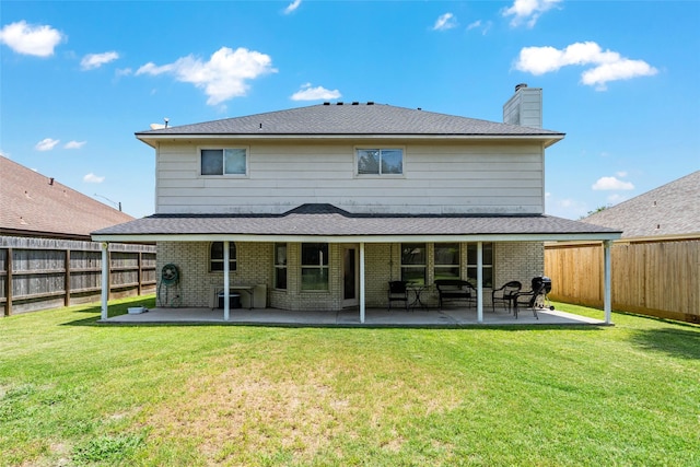 5325 High Bank Dr, Corpus Christi, TX 78413 - rear view of house with a chimney, a patio area, and brick siding