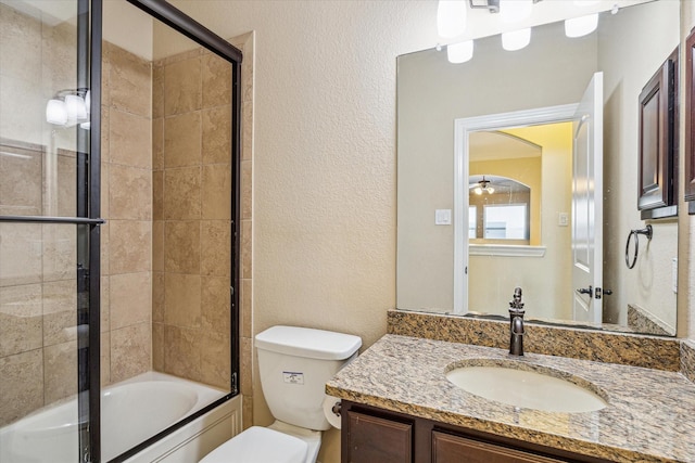 110 Deer Plain Dr, Spring, TX 77389 - bathroom featuring toilet, vanity, shower / bath combination with glass door, and a textured wall