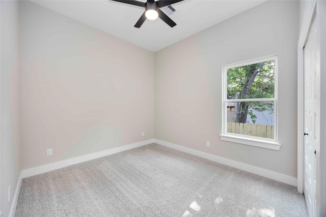 3711 Bain St, Houston, TX 77026 - empty room with ceiling fan, carpet, and baseboards