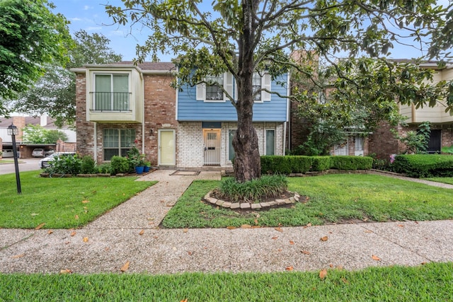 9501 Fondren Rd Unit 9, Houston, TX 77074 - multi unit property with brick siding and a front yard