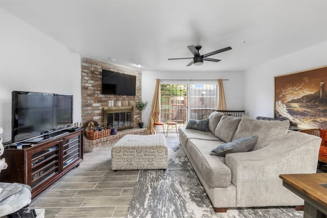 9501 Fondren Rd Unit 9, Houston, TX 77074 - living room featuring a brick fireplace and ceiling fan