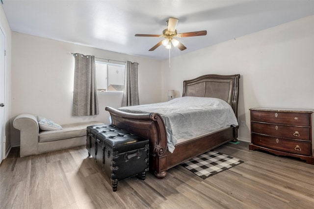 9501 Fondren Rd Unit 9, Houston, TX 77074 - bedroom with wood finished floors and ceiling fan