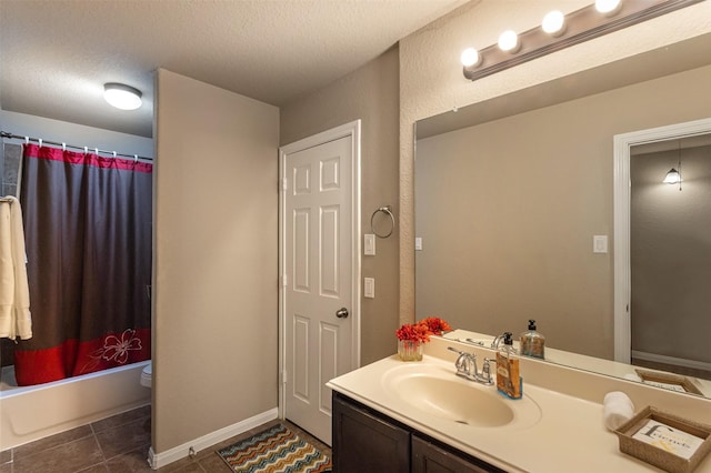 2039 Wembley Way, Rosenberg, TX 77471 - full bathroom featuring vanity, tile patterned floors, shower / tub combo with curtain, toilet, and a textured ceiling