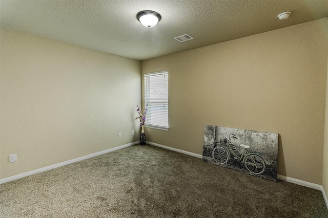 2039 Wembley Way, Rosenberg, TX 77471 - carpeted empty room with a textured ceiling, a smoke detector, and baseboards