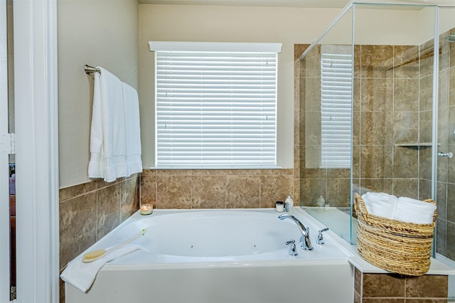2039 Wembley Way, Rosenberg, TX 77471 - full bathroom featuring a jetted tub and a tile shower