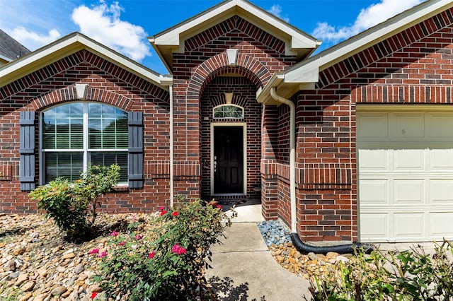 2039 Wembley Way, Rosenberg, TX 77471 - property entrance featuring brick siding and a garage