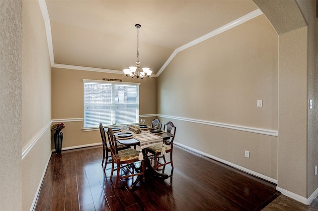 2039 Wembley Way, Rosenberg, TX 77471 - dining area with ornamental molding, lofted ceiling, wood finished floors, a chandelier, and baseboards