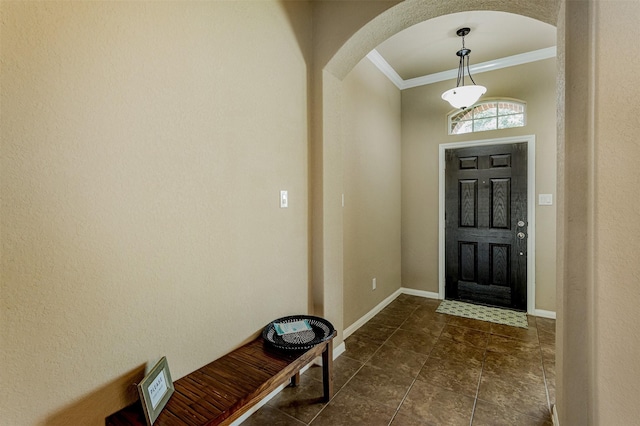 2039 Wembley Way, Rosenberg, TX 77471 - foyer with ornamental molding, arched walkways, and baseboards