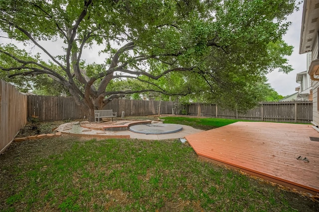 21415 Park Timbers Ln, Katy, TX 77450 - view of yard featuring a wooden deck and a patio area