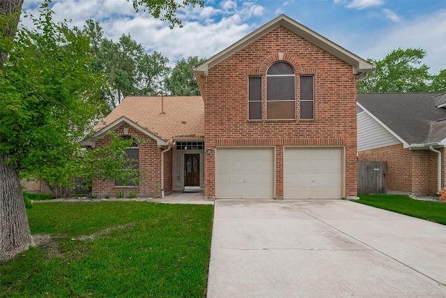 21415 Park Timbers Ln, Katy, TX 77450 - traditional home with brick siding, concrete driveway, a garage, and a front lawn